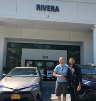 Mo Jr. with a customer at Rivera Toyota of Mt. Kisco